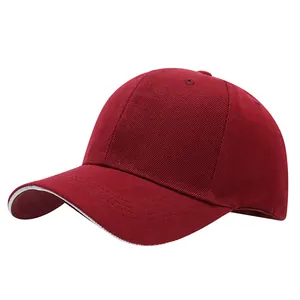 Detailed close-up of a maroon baseball cap with a subtle white trim on the brim edge.