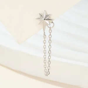 Close-up of S925 silver star stud earring with long hanging chain tassel detail