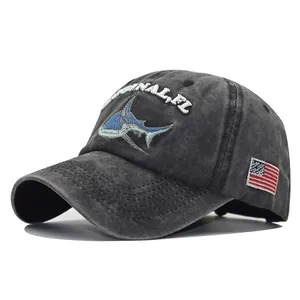 Washed charcoal grey baseball cap with shark embroidery and US flag side patch