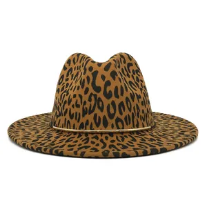 Detailed view of leopard print fedora hat with elegant gold metal band