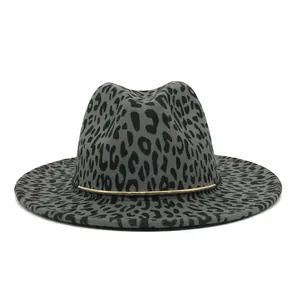 Frontal macro view of leopard print felt fedora with gold ring band detail