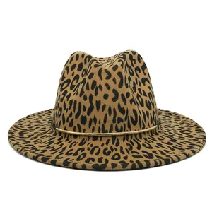 Detailed view of leopard print fedora hat with elegant gold metallic band accent