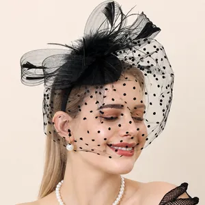 Elegant black mesh fascinator veil with polka dots, feather bow and glove set for weddings