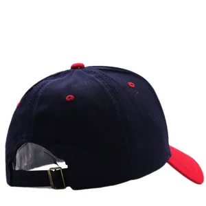 Back view of navy blue baseball cap with red brim, featuring an adjustable metal buckle strap