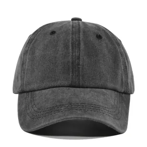 Macro view of vintage washed charcoal baseball cap with distressed cotton texture