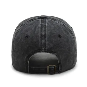 Back view of a vintage washed black baseball cap with an adjustable metal buckle strap.