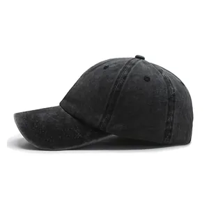 Detailed side profile view of a vintage washed black distressed cotton baseball cap for unisex.