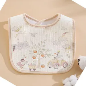 Close-up of thickened cotton gauze baby bib with cute animal illustrations.