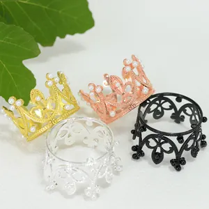 Set of 4 colorful mini alloy crowns with pearl accents for cake or wedding decor