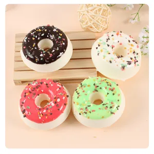Set of four realistic simulation PU donuts in chocolate, vanilla, strawberry, and lime
