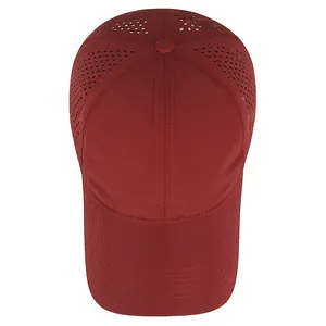 Top view of a red quick-dry baseball cap with laser-cut ventilation holes for breathability.