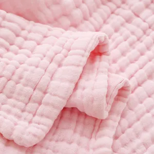 Close-up detail showing the soft texture of pink six-layer cotton muslin gauze fabric