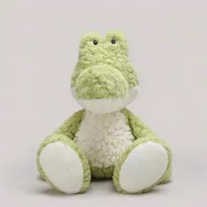 Soft green crocodile plush toy with textured fur and cute bead eyes in seated pose