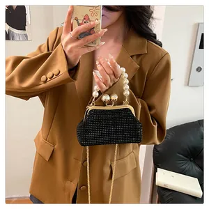 Black rhinestone evening bag with pearl handle and gold chain strap for women
