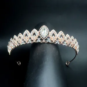 Detailed view of the sparkling rhinestones on this baroque rose gold alloy tiara.