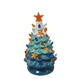 Ocean-themed ceramic Christmas tree with starfish and LED lights for tabletop decor