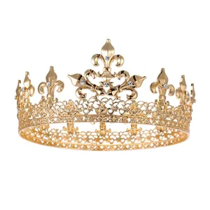 Detailed close-up of a golden Baroque crown featuring fleur-de-lis and rhinestones