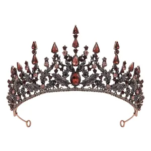 Gothic Baroque crown with dark red crystals, bat-themed Halloween tiara headpiece detail.