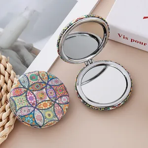 Retro patterned round folding makeup mirror with glitter finish and double-sided design