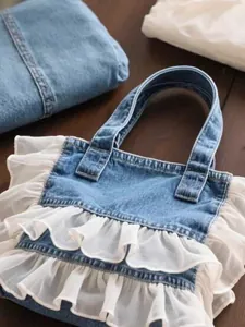 Fashionable blue denim tote bag featuring elegant double ruffled lace trim for women