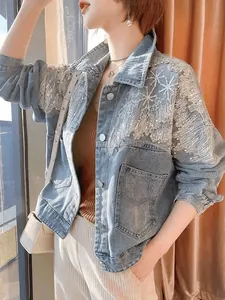 Loose fit denim jacket with heavy sequin and rhinestone embellishments for women.