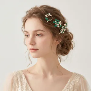 Elegant forest-style gold-tone hair clip set with green enamel leaves and white pearls