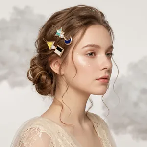 Elegant forest style enamel hair clips with faux pearls shown on a female model
