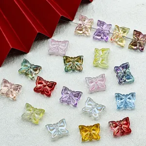 Detailed view of colorful butterfly glass beads for DIY jewelry making projects