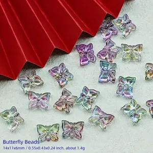Detailed view of iridescent glass butterfly beads for DIY jewelry crafting 14x11mm