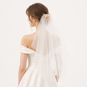 Elegant double-layer bridal veil with pearl flower hair comb for weddings