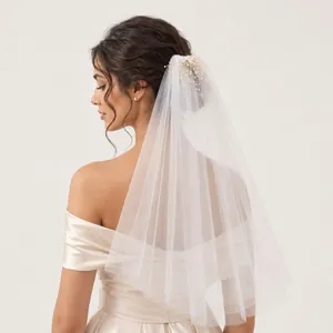 Elegant double-layer bridal veil with pearl flower hair comb for wedding photography