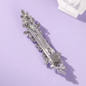 Elegant silver rhinestone hair clip with sturdy metal spring clasp for bridal styling