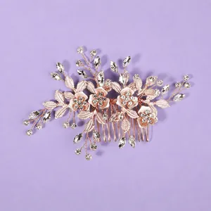 Elegant vintage rose gold floral hair comb with sparkling crystals for bridal hairstyles