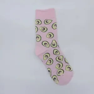 Detailed view of soft pink mid-calf socks featuring a cute all-over avocado pattern