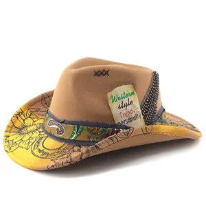 Detailed view of a Western wool felt cowboy hat with sunflower patterns and feather detail.