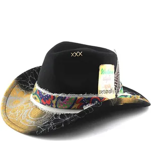 Macro detail of a black wool fedora hat with patterned brim and feather accessory