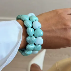Set of candy-colored heart beaded elastic bracelets for women featuring a glossy finish