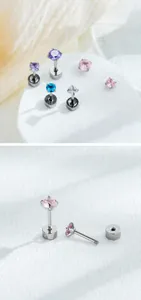 Close-up of mini four-prong cubic zirconia stud earrings for cartilage piercing