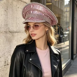 Fashionable pink punk style captain hat embellished with sparkling rhinestones and silver studs
