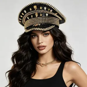 Close-up of a punk style navy hat with gold studs and sparkling rhinestones