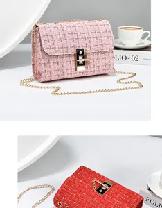 Detail view of pink and red tweed crossbody bags featuring elegant gold chain straps