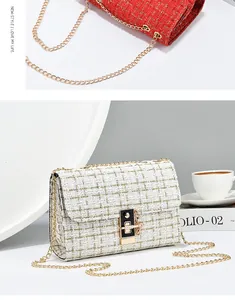 Close-up detail of elegant tweed chain crossbody bags in red and white woven fabric