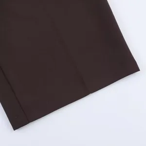 Detailed close-up view of the dark brown casual shorts hem showing quality stitching work.