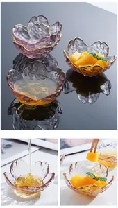 Macro view of cherry blossom glass dipping bowl with gold rim and hammered texture