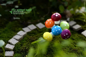 Close-up detail of colorful miniature foam mushrooms for micro landscape garden decor