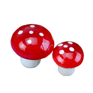 Two miniature red foam mushrooms with white spots for fairy garden decor