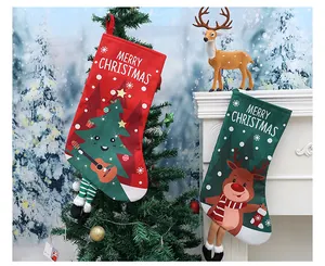 Festive red and green Christmas stockings hanging on a tree and mantle for home decor.