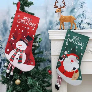 Set of festive Christmas stockings with snowman and Santa designs for holiday home decorations