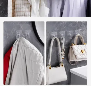 Heavy duty adhesive wall hooks shown holding a heavy jacket and bags to demonstrate strength.
