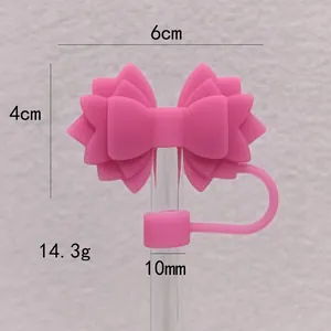 Detailed macro view of pink bow silicone straw topper for 10mm cups with measurements